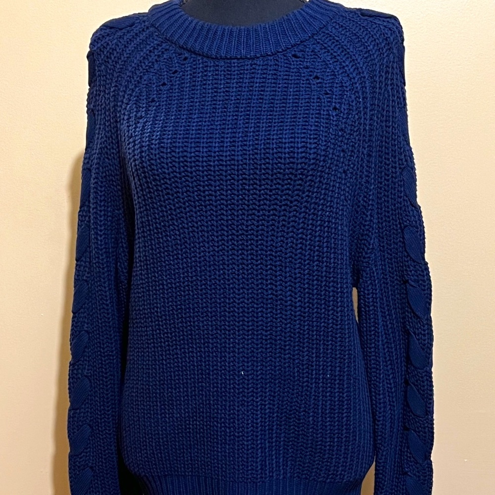 Fancy blue ribbed sweater with ribbon design on sleeves